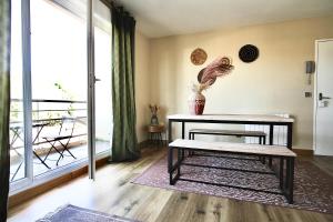 Φωτογραφία από το άλμπουμ του Appartement chaleureux Parking privé σε Corbas