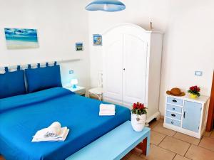 Postel nebo postele na pokoji v ubytování B&B Casa De Mare