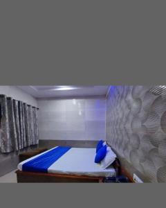 Postel nebo postele na pokoji v ubytování Hotel Simla Inn