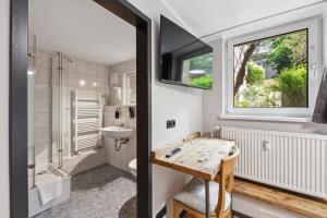 Koupelna v ubytování Hotel Comenius