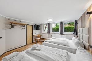 Postel nebo postele na pokoji v ubytování Hotel Comenius