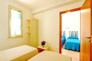Postel nebo postele na pokoji v ubytování B&B Casa De Mare