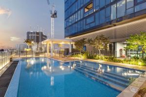 a swimming pool on the roof of a building at Perth Hub in Perth