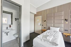 Koupelna v ubytování Hotel Comenius