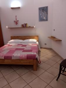 Łóżko lub łóżka w pokoju w obiekcie Il Pesco - CIR 0024