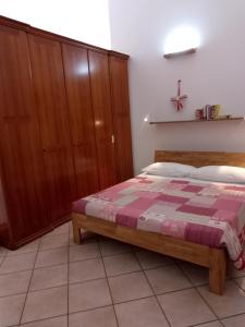 Łóżko lub łóżka w pokoju w obiekcie Il Pesco - CIR 0024