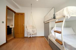 Ένα ή περισσότερα κρεβάτια σε δωμάτιο στο Casa de Descanso by Vintage Travel +24 φωτογραφίες