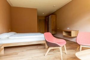 Postel nebo postele na pokoji v ubytování ChieneHuus - vegetarisches Hotel und Seminarhaus