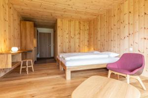 Postel nebo postele na pokoji v ubytování ChieneHuus - vegetarisches Hotel und Seminarhaus