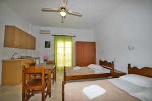 Postel nebo postele na pokoji v ubytování Ira Apartments + 37 fotografií