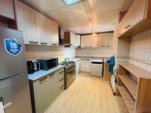 Kuchyň nebo kuchyňský kout v ubytování 3-bed penthouse apartment + 17 fotografií