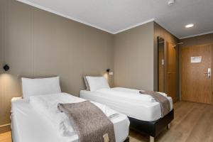 Stracta Hotel Mosfell客房内的一张或多张床位