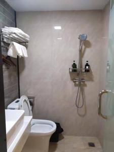 Koupelna v ubytování Longxiang intelligent Hotel