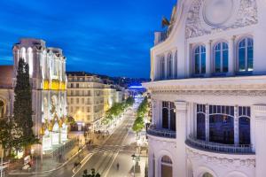 a view of a city street at night at Best Western Hotel Lakmi Nice in Nice