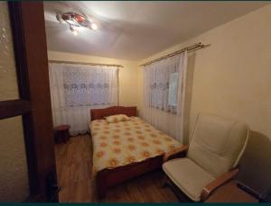 Postel nebo postele na pokoji v ubytování Vatra Moților