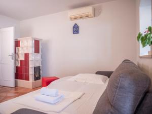 Postel nebo postele na pokoji v ubytování Apartment Jelka- center of Hvar town