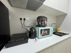 Η κουζίνα ή μικρή κουζίνα στο Kuching Riverine at 5 pax