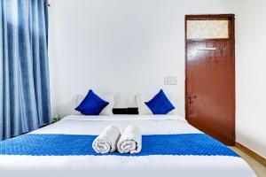 Postel nebo postele na pokoji v ubytování Hotel Great Near Hauz khas Deer Park