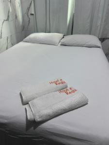 Postel nebo postele na pokoji v ubytování Hotel e Pousada REQUINTTE