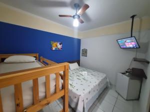 Postel nebo postele na pokoji v ubytování Pousada Brilho De Paraty