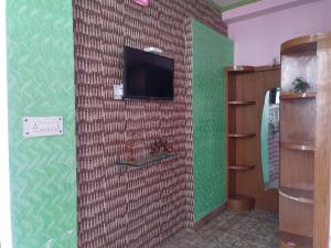 TV a/nebo společenská místnost v ubytování DWARIKA HOTEL