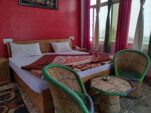 Postel nebo postele na pokoji v ubytování DWARIKA HOTEL