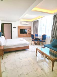 Voodi või voodid majutusasutuse Sama Hamra Hotel toas