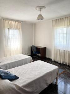 Ένα ή περισσότερα κρεβάτια σε δωμάτιο στο Casa Villa Sambad - Costa da Morte +42 φωτογραφίες