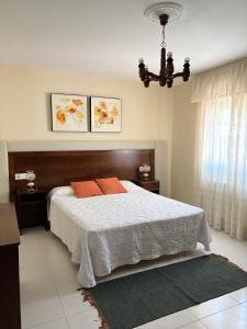 Ένα ή περισσότερα κρεβάτια σε δωμάτιο στο Casa Villa Sambad - Costa da Morte