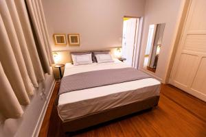 Postel nebo postele na pokoji v ubytování Hotel Municipal Araraquara + 200 fotografií