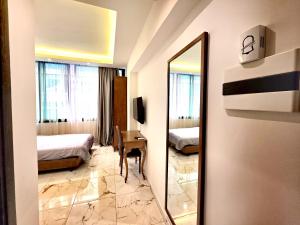 Voodi või voodid majutusasutuse Sama Hamra Hotel toas