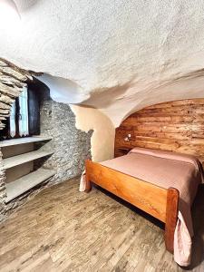 Postel nebo postele na pokoji v ubytování B&B Terra di confine