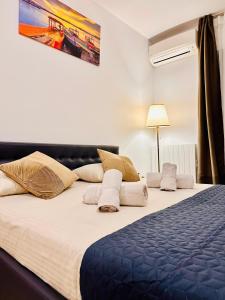 Giường trong phòng chung tại Beachside Studio