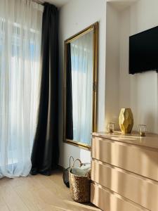 TV/trung tâm giải trí tại Beachside Studio