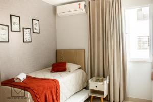 Postel nebo postele na pokoji v ubytování Apt Moderno Próximo da Praia de Atalaia + 35 fotografií