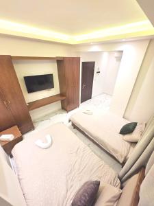 Voodi või voodid majutusasutuse Sama Hamra Hotel toas