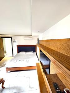 Voodi või voodid majutusasutuse Sama Hamra Hotel toas