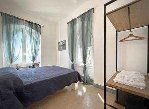 מיטה או מיטות בחדר ב-Hotel Meublè Agavi