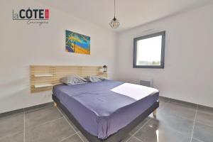 Ένα ή περισσότερα κρεβάτια σε δωμάτιο στο Villa Phi