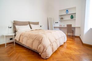 Posteľ alebo postele v izbe v ubytovaní Riviera18