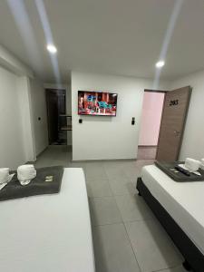 Photo de la galerie de l'établissement HOTEL BLUE GUATAPE, à Guatapé