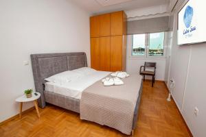 Postel nebo postele na pokoji v ubytování Calm Sea