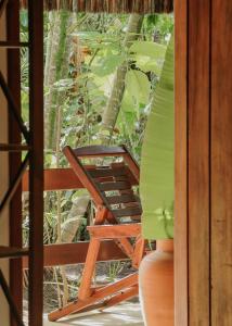 a chair on the porch of a house at Na Villa dos Algodões in Marau