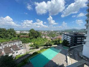 a view of a swimming pool from a building at kkLee Homestay Condo Taiping A-4-6 in Taiping