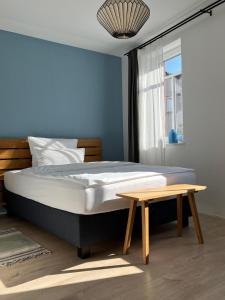 Ένα ή περισσότερα κρεβάτια σε δωμάτιο στο Backsteinhaus Hanau +13 φωτογραφίες