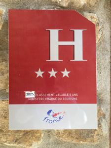 Certifikát, hodnocení, plakát nebo jiný dokument vystavený v ubytování Aux Vieux Arceaux