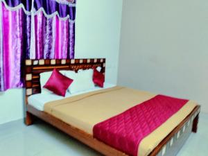 Voodi või voodid majutusasutuse Naadi Nest - 2 Bed Room Service Apartment toas