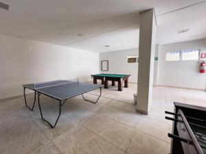 Stolní tenis v ubytování Artrium Thermas Residence Service nebo okolí