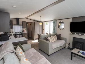 TV a/nebo společenská místnost v ubytování Haven