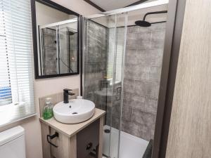 Koupelna v ubytování Haven + 14 fotografií